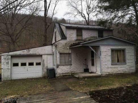 Handyman special! Two bedroom one bath home in Maple Hollow. This property includes a 1 car attached garaged and enclosed porch with laundry. Motivated sellers. Call listing agent for more information or for your tour today.