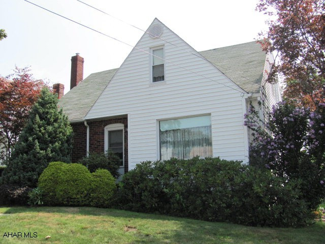 Ebensburg- Beautiful 3 BR, 1  bath Cape Cod home on a 60 x 146 lot with a 1 car integral garage, eat-in kitchen, built in cabinets, wood stove & whirlpool tub in bath.