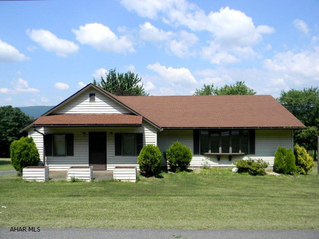 Nice vinyl ranch, 2 BR/ 1 BA on half acre within extended Western view. Very large living room and master bedroom. Formal dining room, full basement w/ large recreation room, 2-car integral garage. This home is priced to sell!