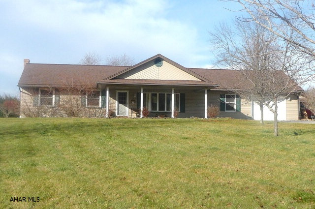 Nice 3BR/2BA ranch home on 3.616 scenic acres w/ 360 views of the mountains. The home offers a beautiful kitchen equipped w/ cherry cabinets, an island, pantry, ceramic tile flooring and skylights. There is also a large formal living room, a large dining room w/ wood burning stove and large family room w/ stone/cedar planked walls. Attached to the home are two garages. One standard one car and a second two car 30'x32' complete w/ heated workshop. The home has multiple heating options w/ an oil or wood fired boiler, a heat pump and standard wood stove. A large supply of firewood is being left for the new owners and extensive gardening opportunities are available. The property is fenced on 3 sides, and is accessed via a tree lined concrete driveway. Less than a 10 minute drive from Bedford.