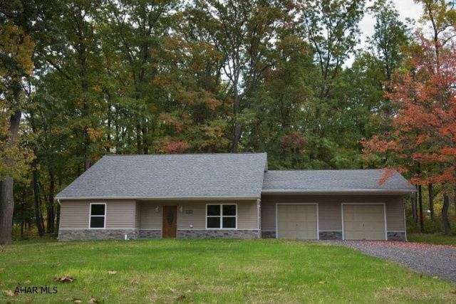 Here is your chance to own a one of a kind NEW property!  Single floor living, open floor plan, beautiful oak trim, loads of window light, and a spacious 2 car garage with over 10' ceilings await you.  Want more storage?  How about an attic that is almost 38x16?  Need more storage still?  Above the garage there's even more!  Brand new everything.  The spacious master bedroom could easily be split into two large bedrooms.  This beautiful new home sits on over half an acre in a quiet andprivate area.  You will not find another home like this.  Call the listing agent for your private tour today!  Priced to sell, this property will not last.  It is only waiting for you to bring your personal belongings in.  An option to purchase land to the rear is available too!