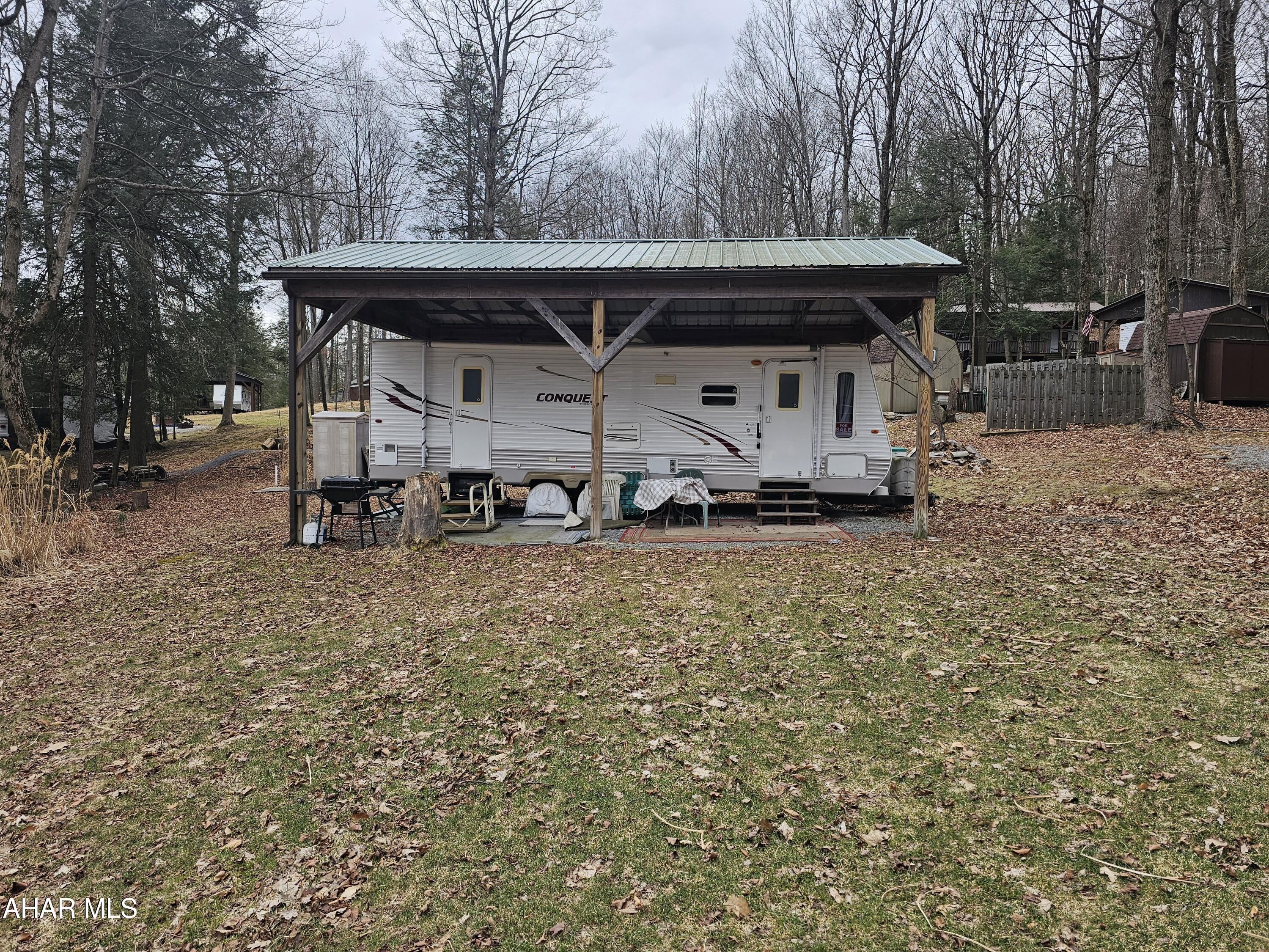 2011 travel trailer camper on 1 lot inside Glendale Yearound. Camper is in good condition. Everything works. Camper is under a pavilion to protect roof from snow or the occasional tree limb. Glendale Yearround is a gated community located minutes from Prince Gallitzin and Glendale Lake. Community pool, basketball, tennis, security and more.