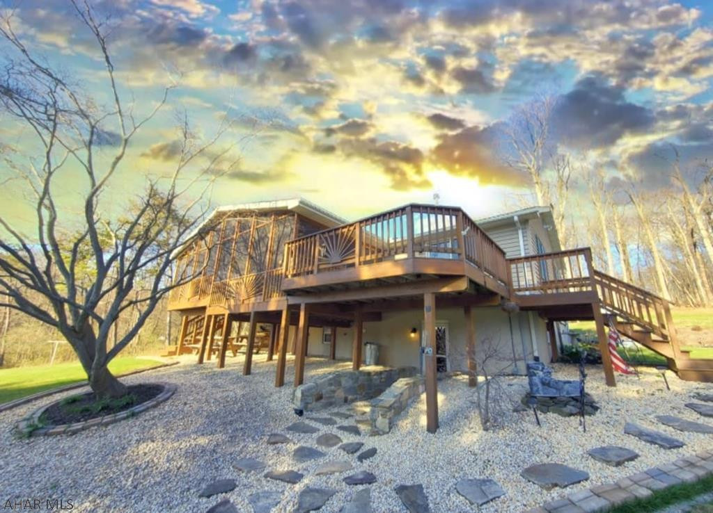Gorgeous Farm Ranch located in Brodbecks  at the end of a secluded lane and situated on approximately 12 breathtaking acres!! This home features central air,  2 kitchens, 2 amazing covered/screened in decks overlooking the land, a 3rd deck off the master bedroom,  and an enormous 4 car detached garage with plenty of storage for all your vehicles and toys! Call to schedule your private showing! Preapproved buyers only.  Buyer to confirm taxes, square footage, and lot size!