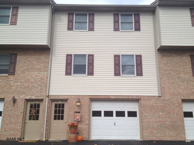 Immaculate brick & vinyl townhouse! New carpeting, tile floor & lighting. 2 bedrooms, eat-in kitchen with range & dishwasher, 1 full bath, plus two half baths on 2nd floor & half bath on 1st floor! Deck, central air, window coverings, garage with openers, HASD & more!