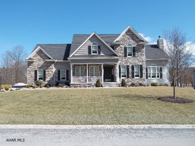 Outstanding quality from beginning to end in the wonderful 4 Bedroom, 4.5 Bath custom built home on 0.939 acres in Fox Hollow! Terrific kitchen design from Showcase Kitchen's w/large island 6 burner gas range, SS appliances, Double ovens w/ convection, granite counter tops and lovely solid Maple cabinetry.Wonderful eat in kitchen area looking out to back covered deck, yard and wooded area. Great room features cathedral ceilings and  nice stone wood burning fireplace. Beautiful hardwood floors throughout foyer,living room,dining room ,kitchen areas & staircase. Large master bedroom suite, Rec Room, office/den, full bath,large storage space complete the walk out lower level. 3 car garage, 3 zoned heat. Elongated Anderson windows on first floor bring lots of natural light.