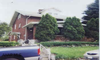 2 STORY CLASSIC BRICK ON LARGE 125X120 CORNER LOT WITH 1 CAR DETACHED GARAGE.  LOVELY BRICK. NEEDS UPDATED BUT CLASSIC STYLE WITH HUGE CORNER LOT. GREAT LOCATION. HOME WARRANTY. NO SHOWINGS UNTIL SAT. 5/17.