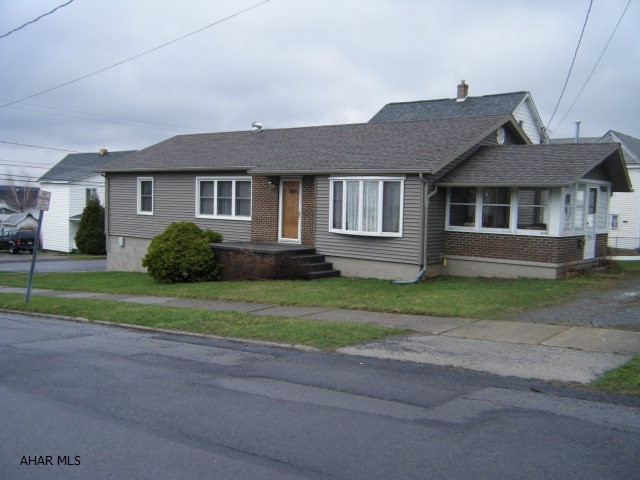 This home was moved to this site about 1980. The age is estimated to be 50 years. It was owner occupied til 1998. Since then the family has taken care of the home. The condition is average to good. The vinyl siding, windows and roof are 3 years old. There is an enclosed entry room, unheated. The gas hot water heat system has 3 zones. Laundry facility in the basement. The garage is integral. It should have insulation installed in the ceiling of the garage.