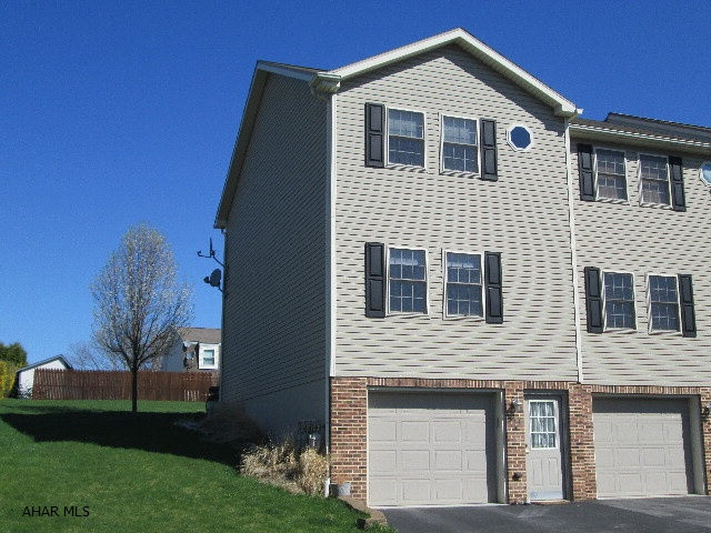 Hollidaysburg/Penn Farms townhouse. This house is better than new with all the upgrades. Tile floors, newer appliances stay and larger master bedroom. Be sure to enjoy the outdoors on the private rear deck with the sunsetter awning. Great views!