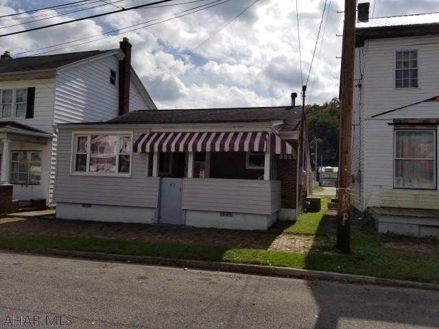 Cozy 2 bedroom brick rancher with modern kitchen and bath. Heated sunroom. Gas forced air heating system with central air conditioning. 1 car carport.