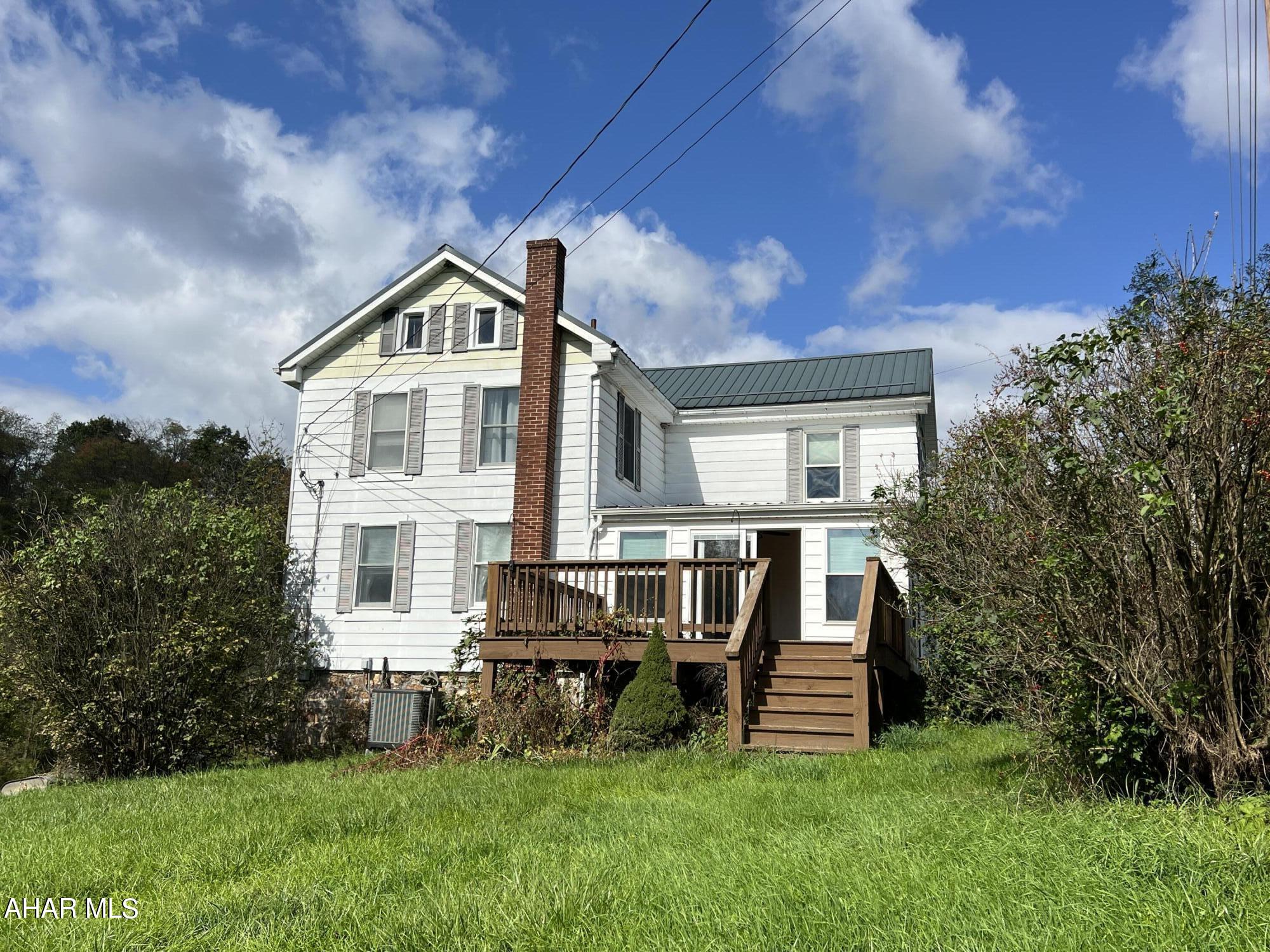 Located in the heart of beautiful Hartslog Valley, Huntingdon County is this charming, rare find! There are so many options for this 10.3  property, with it's close proximity to Raystown Lake and all it's outdoor activities you could make it your summer getaway with lots of space to store your boat and/or RV.  It's also conveniently located to State College and Altoona, and would make a great place to stay for those PSU football weekends!  Are you a hunter? Why not use it as a hunting lodge?  The property consists of a large 3 bedroom, 1 bath farmhouse, barn, shed, and almost 2 acre stocked pond, where geese, turtles and other wildlife can be seen.  The kitchen was recently updated, along with a sunroom and deck with amazing views of the pond.  A heat pump with A/C was added in 2017 for your year-round comfort. The barn is original with hand made logs and it has a large barn floor for storage or hay and the bottom has several areas for animals or just use for additional storage.  Take a look for yourself and imagine all the possibilities this great property has to offer.