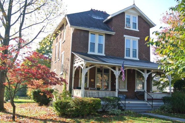 Classic Boro brick beauty! Very fexible floor plan, 3 or 4 bedrooms on 2nd floor, bath was recently renovated. 3rd floor is a perfect master or teen suite...complete with claw foot tub. Ikea kitchen w/center island and appliances. C/A, updated electric...good mechanics. Huge yard complete with fenced area for young children. Relax on the front or back porches. Walk to post office & coffee shops. This home is not located in the designated Historic District.