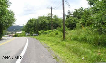 7.141 +/- acres w/approx. 400 ft. U S Route 30 frontage.    Buyer to pay for both transfer taxes and surveying.  Great Commercial Site. Large site which is quite scarce! 7.141 +/- acres w/approx. 400 ft. U S Route 30 frontage.   "Agents maybe requested by owner to be a seller agent or a seller subagent."