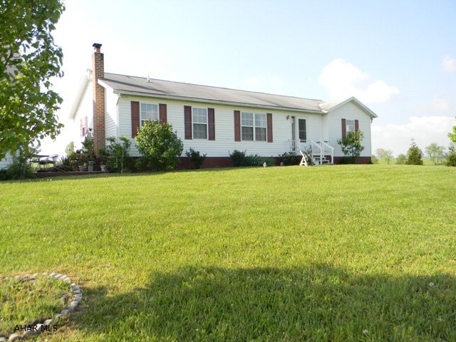 3 Bed/2 Bath Ranch on 20.43 Acres. Kit, L.R., D.R., Huge Sun Porch, Full Finished Bsmt. w/ Rec Room, Full Bath & 2 Add. Beds. Oversized 2-Car Garage, Sheds and Fencing. HP FA/CA, 200 Amp Electric & Pellet Stove. Open, Rolling Land, Pond & Gorgeous Views.