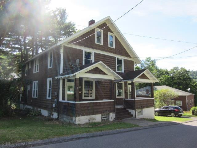 Solid two story in Johnstown, quiet street, side-by-side units each with three bedrooms and one bath, detached garage, wood flooring, one unit has an updated kitchen, great investment property, Property was built prior to 1978 and lead based paint potentially exits. This property may qualify for Seller Financing (Vendee).