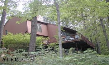 Privacy with a View!  Open and spacious with tons of natural light enhance the experience of owning this home.  All this in the prestigious area of Stonehedge. Privacy with a View!  Open and spacious with tons of natural light enhance the experience of owning this home.  4-5 bedrooms with 3.5 bathrooms, hardwood and ceramic floors, upstairs all new carpeting.  Enjoy cooking in this spacious kitchen with stainless steel appliances and eating area with a view.  Great Room has vaulted ceiling with stone fireplace, den/study off great room.  Wake every morning in the master bedroom to a spectacular view.  Full finished basement with possible 5th bedroom, family room, game room and full bath.  Walk out from basement.  Private deck.  All this in the prestigious area of Stonehedge.