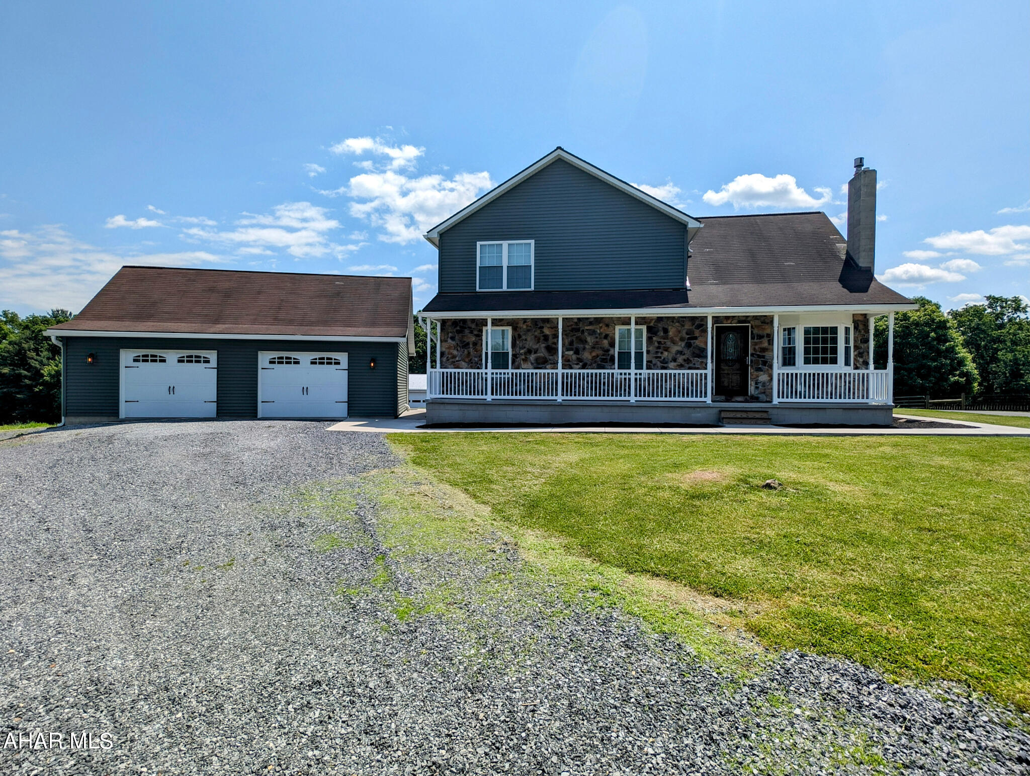 Country living at its finest! Come and see this 22+/- acre property that includes a 3-bed, 3-bath home, 6 acres of tillable land, and 3 acres of fenced pasture attached to a 30'x70' pole barn, with the remaining acreage providing a small stream and place to enjoy the outdoors and hunt. The main floor offers an open concept with an open kitchen, dining room, and living room featuring a propane fireplace, 2 bedrooms, 1 bath, and a laundry mudroom. The second floor offers a master bedroom, a walk-in closet, a full bathroom, and a loft overlooking the living room. The finished basement offers a family room, kitchen, 3/4 bath, laundry room, and bonus room. The exterior features recently installed vinyl siding and railing, a rear trex deck, concrete sidewalks, a detached two-car garage, a woven wire-fenced pasture, and much more. The setting of this property provides an excellent place to get away from the hustle and bustle of life and enjoy the outdoors, with easy access to the PA Turnpike, I-70, and I-68.