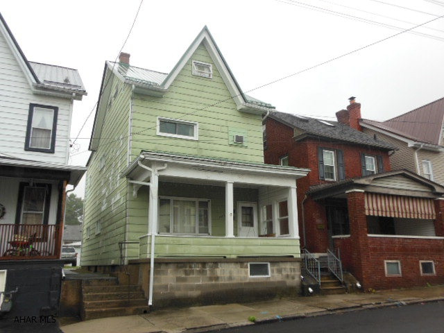 Good, sound, 2.5 story home in Pleasant Valley area at top of hill on city side. Somewhat isolated street.  Newer metal roof, off street parking in rear, 3-4 bedroom home (attic has electric wall heater).  Home has cement basement floor, updated GHW furnace, 100 amp breakers, copper plumbing and more.  Roomy kitchen with divider-counter. Large rooms and full bath with shower. Carpet & vinyl flooring, cement front porch, blown in insulation through exterior.