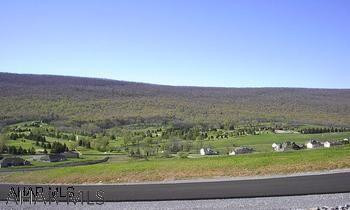Breath taking views!  This premier development offers paved roads, public sewer & underground utilities.  Adjacent to the Scotch Valley Country Club & within 15 minutes of shopping, parks and entertainment.  Buyer must drill a well.