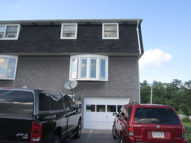 Nicely updated 3 bedroom townhouse with garage. Remodeled kitchen with dishwasher and new appliances. Two heating systems. Gas hot air & electric baseboard. $145/mo assoc fee includes outside maintenance, swimming pool use, trash, roof, mowing, snow removal