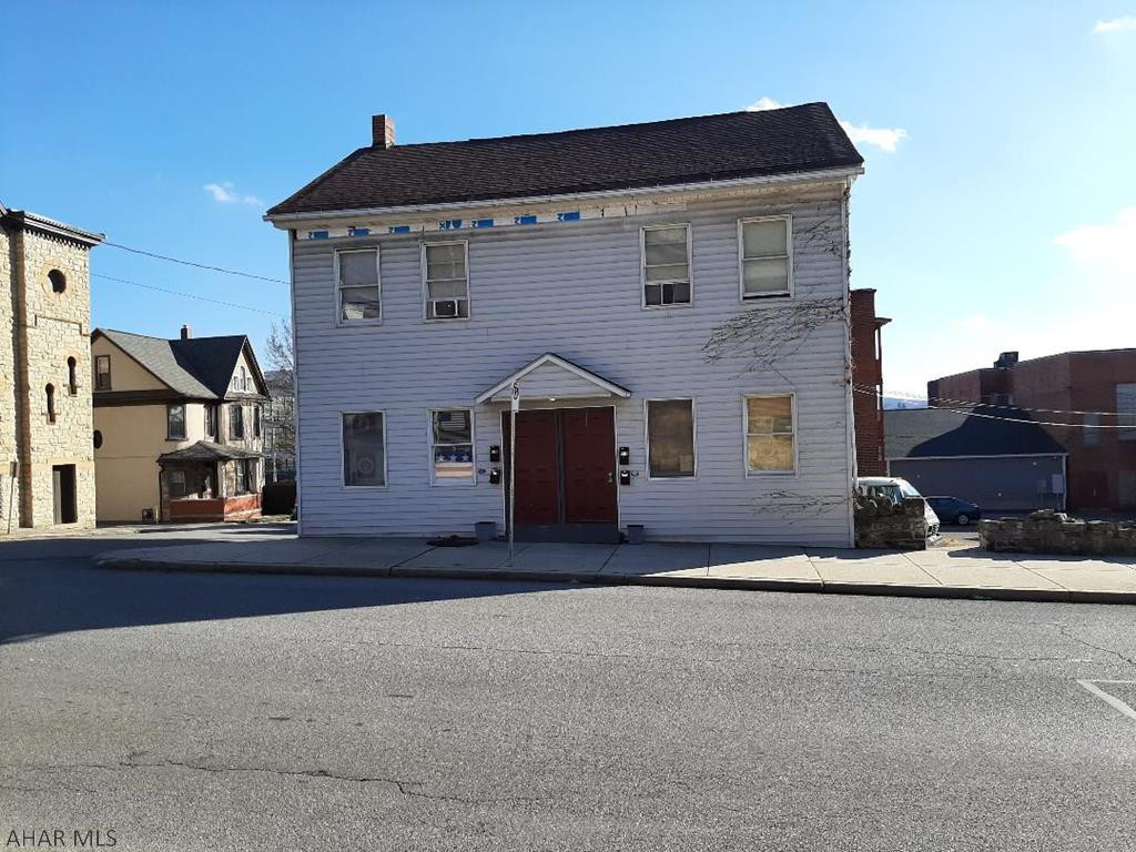 Fully rented, 4-Unit, studio apartment building.  No leases.  The above net income assumes you will get a loan with 20% down.  It factors in all utilities, taxes, insurance, repairs & maintenance, reserves for replacement, a management fee and a loan payment.  Price is based on a 9.25% cap rate.  Call Listing Agent for cost breakdown.  Owner pays all utilities except trash & cable.  Though currently fully rented, if you get a vacancy, you can rent to anyone, including college students.  Off street parking.
