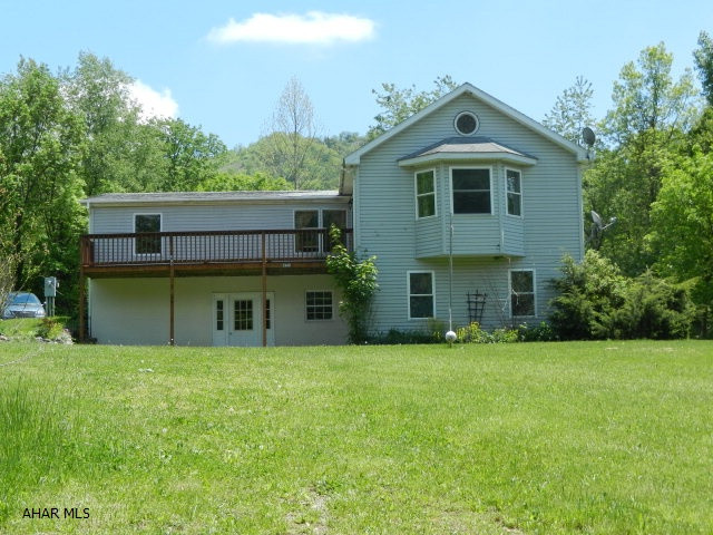 Private setting  3.1 acre spacious manufactured home on full foundation. basement is completely finished. new carpet, move in condition. large detached two car garage, 2 heating options, outdoor furnace burns wood or coal. also has a oil furnace both are hot water heat. and central air.