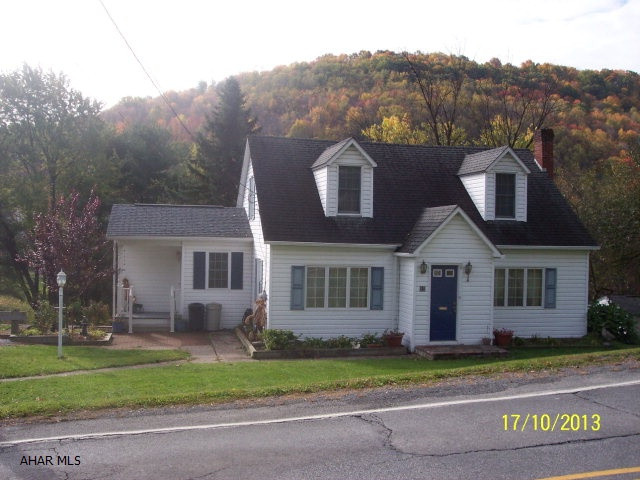 Cape cod style home on 0.43 acres with stream in back yard. 3/4 bath, laundry, and finished room in basement are part of newer addition. High ceilings in basement with additional 3/4 bath, potential to be finished.