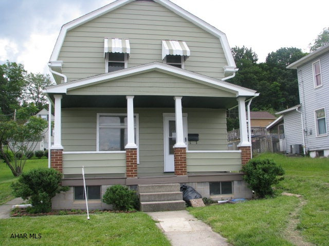 Totally redone.  New Kitchen!! Stove and Refrigerator are new.  Has just been totally repainted and all new carpeting.  Full bath upstairs is totally renovated.  Nice size eat in kitchen with a room off it which could be used as a breakfast nook, mud room, or laundry room.  Second floor has two bedrooms and bath.  Third room could be made into office or large walk in closet. Basement has been professionally waterproofed.