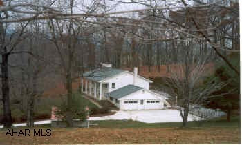 Beautiful Bi-Level on 2.168 Acres, 4BR, 3BA, LR, DR, Kitchen, Family Rm, Rec Rm, Office, 2-Fireplaces, Hardwood & Cermic Floors, Security Systems, Skylights, Generator, Cement Driveway,16X20 Sunroom. Private.