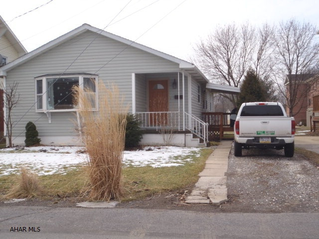 Immaculate vinyl sided rancher features laminate floors, tile entrance, mostly newer windows, newer roof, small covered deck.  Basement has bedroom, 3/4 bath, and partially finished family room.  Pulldown stairs for attic storage.  Deep back yard.