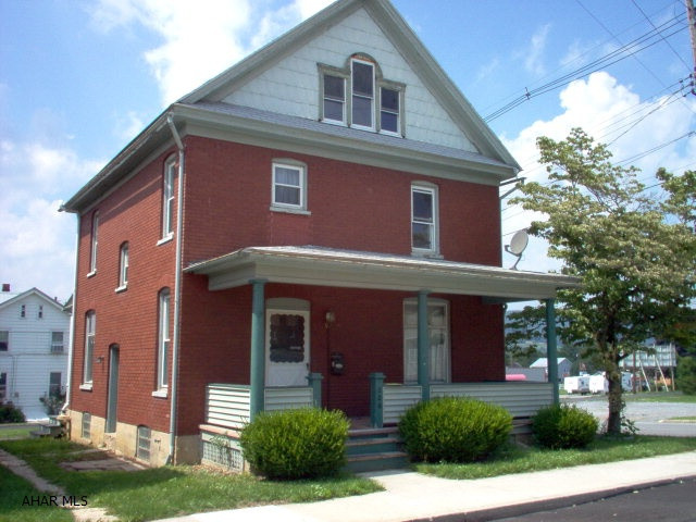 Brick house in Martinsburg with great potential; Good Mechanics, Central Air, Corner Lot, Pocket Doors, needs some cosmetic and finishing work.  Property being Sold AS-IS, Where Is