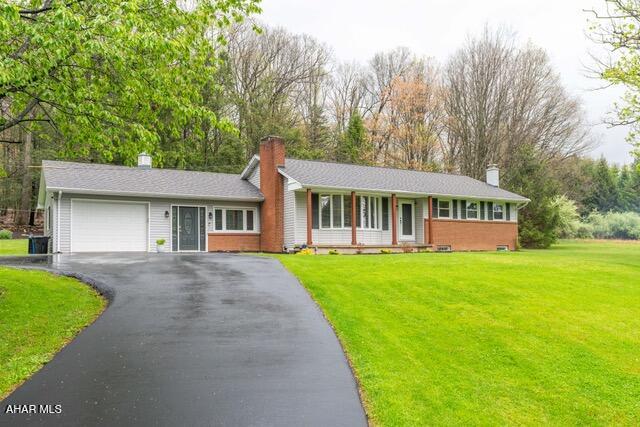 Welcome to 2280 Kettle Road--where privacy meets convenience just minutes from Altoona. Tucked behind a row of
pine trees, this charming 3-bedroom, 2.5-bath ranch welcomes you with a peaceful, secluded feel from the moment
you pull into the driveway. Step inside to a spacious bonus room currently used as a dining area--perfect for hosting gatherings or reimagining to suit your lifestyle. Just a few steps away, the eat-in kitchen shines with granite countertops, open shelving, and a stylish barn door pantry that adds both character and function. Beautiful hardwood floors flow throughout the main level, making maintenance a breeze. The inviting living room features built-in shelving and a cozy wood-burning fireplace--ideal for relaxing on chilly winter evenings. A
convenient half bath sits just off the living room, while down the hall you'll find a full bath and three generously sized
bedrooms. Head downstairs to discover a stunning finished basement with luxury vinyl flooring throughout. This versatile space includes a laundry/utility room, two bonus rooms one currently used as a guest bedroom and the other as an office, a full bathroom with a sleek glass shower and a spacious family room with a woodburning stove. Out back, unwind in the heated sunroom that opens to a stamped concrete patio--perfect for entertaining or simply soaking in the serenity. The expansive 3.66-acre property offers a beautiful mix of open space and wooded areas, creating a peaceful setting where you can enjoy nature and local wildlife.
Located in the desirable Sinking Valley area, this home offers the perfect blend of comfort, charm, and privacy.
Opportunities like this don't come around often--schedule your showing today before it's gone!