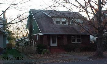 Walk to school! House has some remodeling done - some new carpet .  2 car garage with a screened porch.  Great Location. Call Dianne for details  329-1856  .New heat system 11/2000 and hot water tank. Reduced Price.