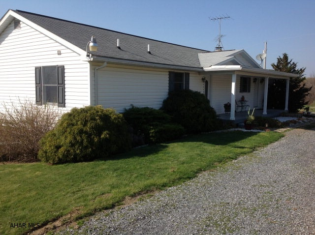 This outstanding ranch home awaits you with breath taking views from the deck on the 5.07 acres. This home has been tastefully up dated and has a great first floor layout along with 2 full baths and lots of closets with spacious bedrooms. The basement has a recreational room or also can be used as a Mother-in-law suite with a full size bath/ jacuzzi tub.This home is move in ready.Freshly painted, and don't miss the beautiful Brazilian exotic cherry floors.