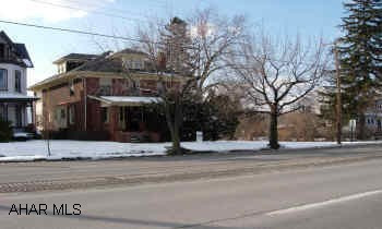 LARGE HOME. VERY LARGE BRICK HOME WITH LOTS OF CHARM.  BEAUTIFUL WOODWORK, SPACIOUS ROOM.