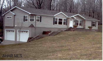 Georgous Double Wide on 2 Car Garage Foundation,Beautifully Landscaped on 1 Acre . Gotta See!!