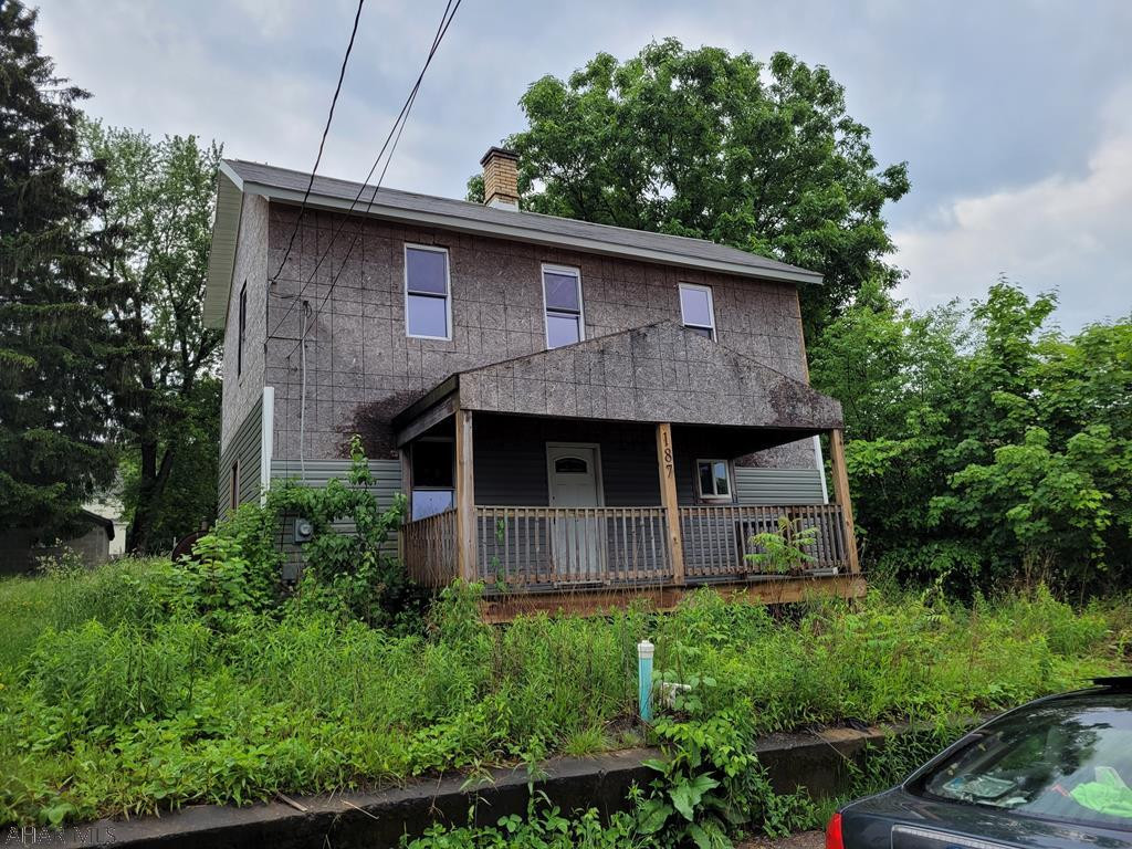 Looking for a fixer upper? This home has new wiring, drywall, kitchen,  bathroom and carpeting. There is a nice fenced in back yard that leads to off street parking. Home is in need of flooring, siding finished  and other cosmetic repairs. Property is being sold as is seller to make no repairs. Call listing agent for more information.