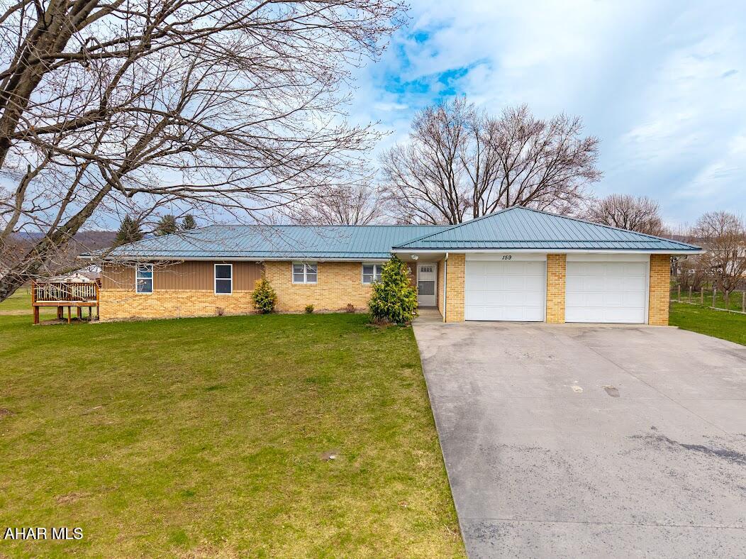 Custom built brick ranch on 1 acre on a level lot.
Open Kitchen, dining room and living room. The kitchen provides ample cabinetry, and built-in stove top on the island. The enclosed back porch makes a nice 3 season room. Master suite has a large walk-in closet with plenty of shelving.
The bonus room/family room is an extra perk for your enjoyment and entertainment. The large deck make it easy access to the back yard.