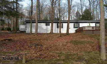Well maintained mobile home on large corner lot. Great starter home or hunting camp.