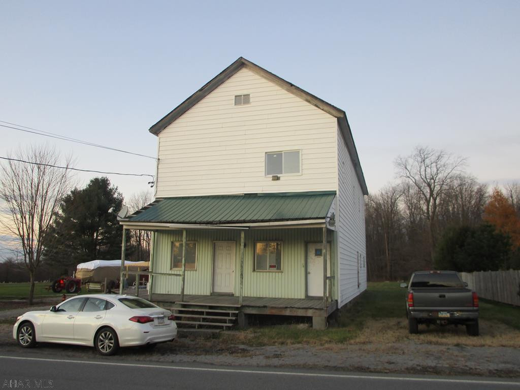 3 unit apartment building with separate elect.   Currently vacant but ready to rent. Second floor units have electric heat. First floor has oil fa heat. Possible 4th unit on 1st floor rear. Great opportunity for additional income at a low price.