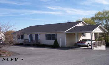 4 unit apartment. 3 two bedroom units and one efficency almost new 4 unit, 3 currently occupied.  refrigerator, range dishwasher, dryer and washer.