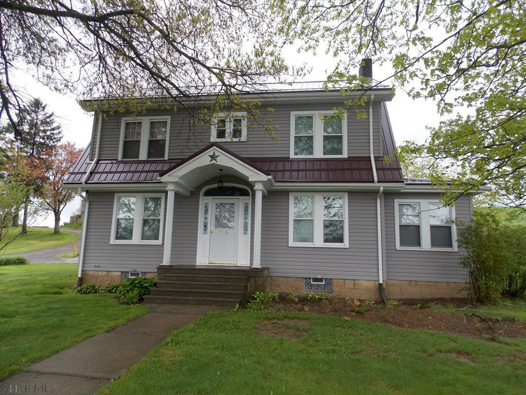 Fantastic home on the outskirts of Ebensburg! Kitchen has stainless steel appliances and first floor laundry. Large living room that features hardwood floors and a cozy fireplace. Formal dining room with new laminate floors. All 3 bedrooms are very spacious and have hardwood floors. Attic could be a 4th bedroom. New roof and new siding 2016. 2 car attached garage and 1 car detached garage gives plenty of storage. Such a peaceful and private property on 10 acres.