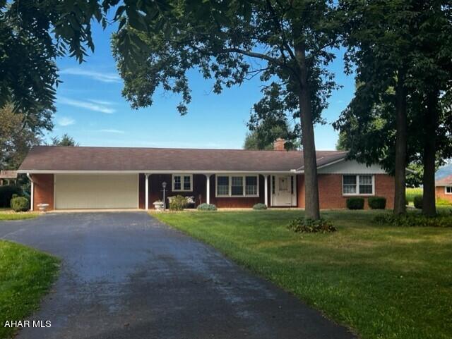 Live in style with this beautifully updated, two bedroom, one and a half bath brick ranch home on 1.742 acres offering captivating views and endless possibilities.  

This bright and spacious property features a range of updates such as new flooring, newer electric panel, radon system, hot water tank, and updated septic pipes from tank to house as well as a new septic tank.  With a large yard, attached 2 car garage and a detached 1 car garage, this home provides plenty of room for storage and parking.     

In addition to the attractive brick exterior, the property boasts even more modern amenities like new gutters, newer water softener with UV light,  macadem driveway and tranquil scenery for a nature getaway without leaving your home.

In addition, prepare to relax in the sunroom that provides an ideal retreat for relaxation and entertainment, allowing you to soak in the natural beauty of your property while enjoying your morning coffee or hosting an evening get-together with friends and family.

This home is sure to impress! Don't wait to own your dream home on Upper Snake Spring Road - close to all amenities.