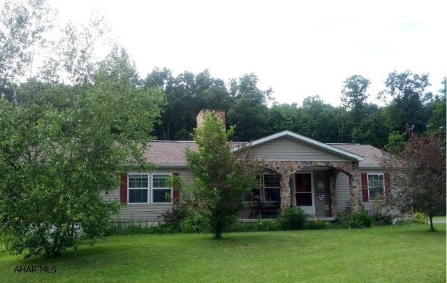Spring Cove Schools. 3 bedrooms, 2 bath, 2001 drywalled doublewide, finished basement, screened porch, vaulted ceilings and 15.9 ACRES!!!! Basement plummed for bath. Nice home with breezeway and attached garage at end of cul-de-sac.  15.94 Acres is according to Tax Card. (Tax Map and Old Survey attached)  #J-260