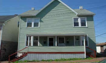 Section 8 approved. Vinyl sided, thermo windows, shingle roof. Nice rental or live in one side.