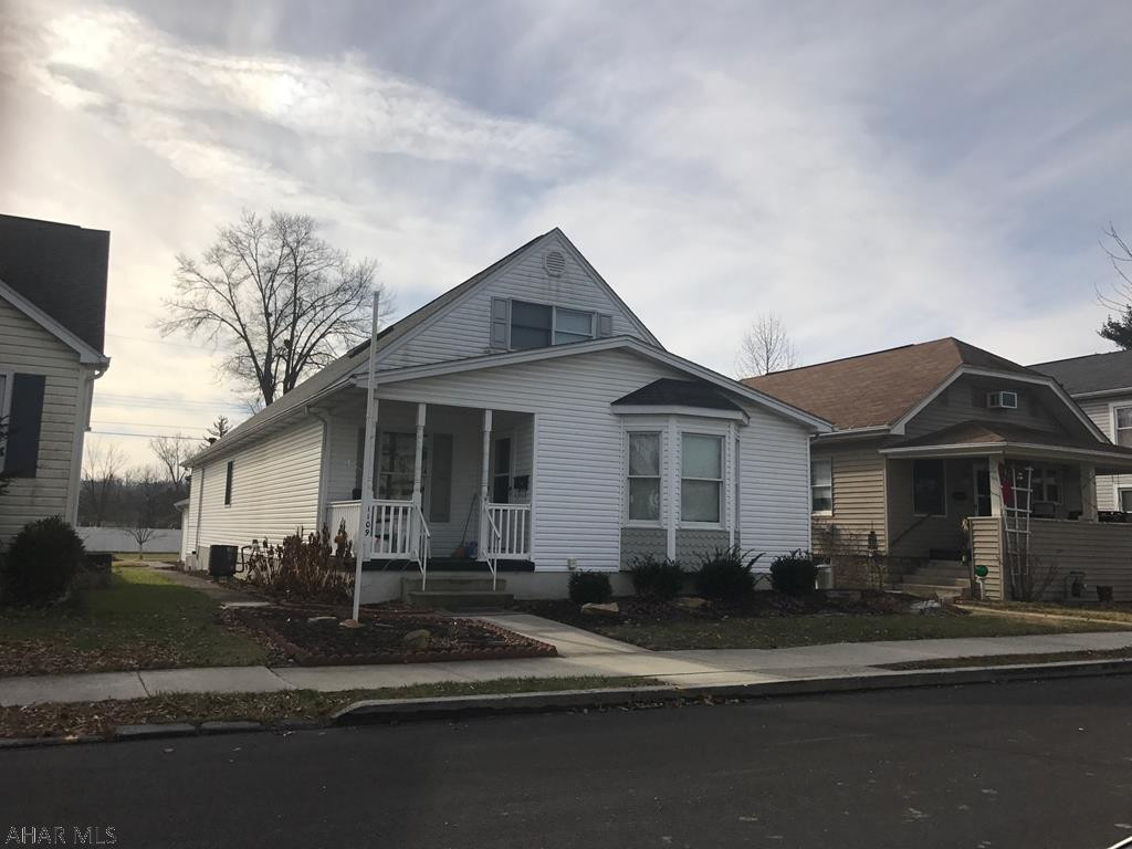Nice open floor plan. Much larger than it appears, nice oak kitchen, dining area, living room, master bedroom with 2 master baths, plus half bath and laundry on main floor. Second bedroom on 1st floor. Two bedrooms plus bonus room and full bath on second floor. Plus two car detached garage.
