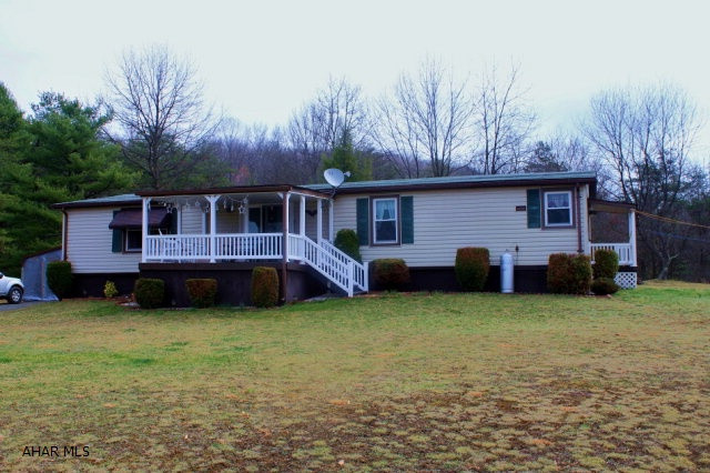 Well-maintained 3bed/2bath on nearly 11 acres in Chestnut Ridge school District.  Have the privacy and great views full-time or as an occasional property.  New windows, roofing, and siding to this fantastic get-away. Within minutes of I-99, local schools and shopping.