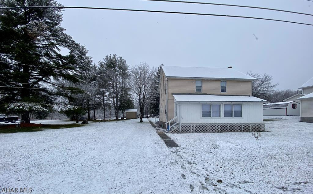 3 BR, 1 BA home located in the unique town of Wood. Wood is situated in three counties, Bedford, Huntingdon, and Fulton. This 2 story home is situated in Huntingdon County and also includes additional lots within Bedford County all recorded on one deed for almost an acre of outdoor space. It is also right down the street from the Wood Park on a quiet street. It has newer windows, a new furnace and new hot water heater and electric has been updated as well as the detached garage having it's own panel box and heat. There are endless opportunities inside the home with a nice layout, small bonus room on second floor, first floor laundry, and a three season room. There is a large one car detached garage/workshop, large shed, and small pond with a country setting.