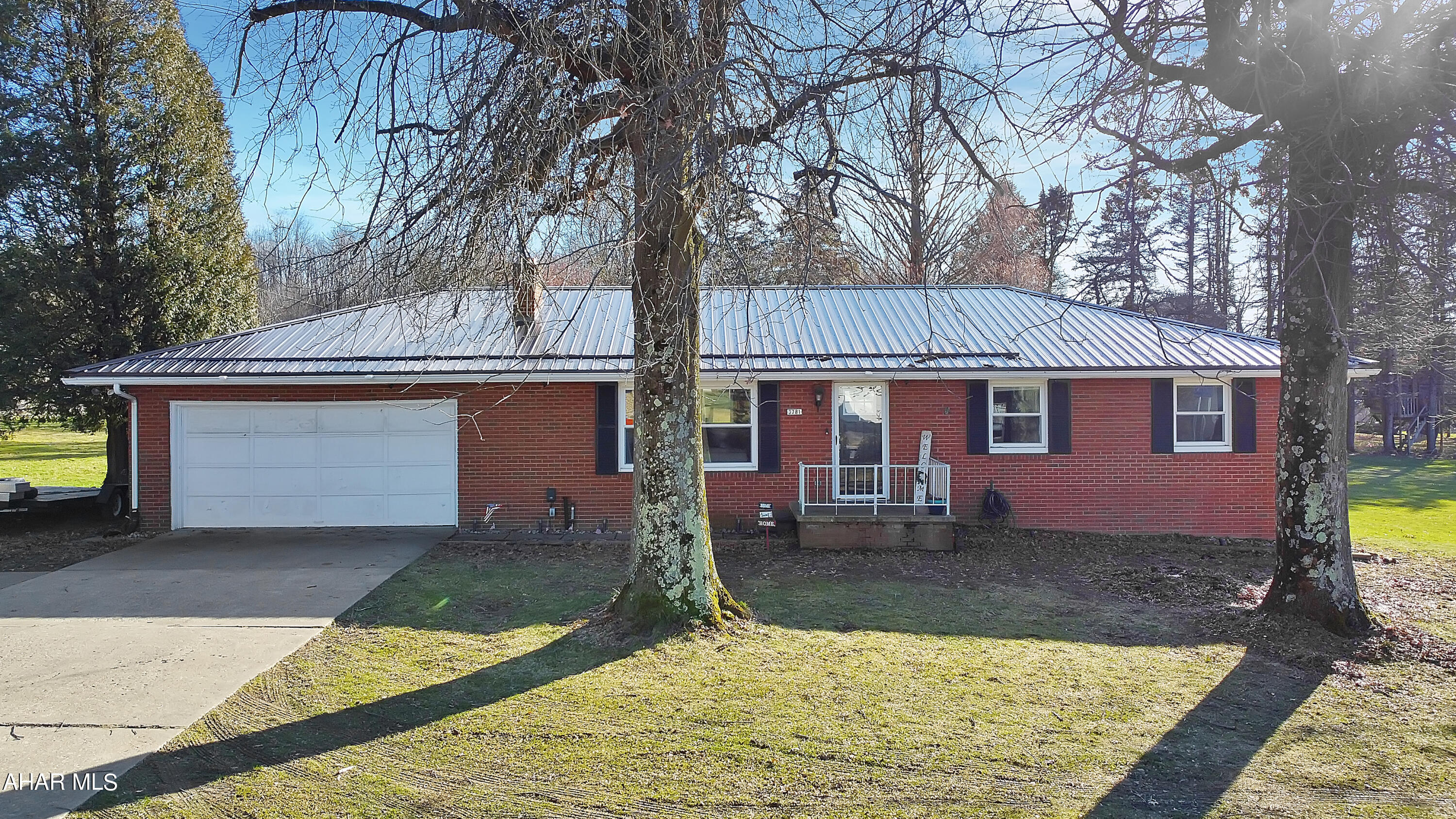 Immaculate, spacious 4 bed, 3 bath home that just recently went under a full renovation from head to toe. This property sits on approximately 4.1 roaming acres split between open fields and woods. The home itself has a 2 car attached garage, fully updated bathrooms, fully finished basement with plenty of room for activities, a walk up attic for storage & SO much more! The exterior of the property features a covered rear porch, an above ground pool, a shed/chicken coop with electric ran to it, & plenty of parking. Nearly everything in the home is brand new. Newer metal roof, furnace, hot water tank, radon system, central air, & just about anything else you can dream of. Don't miss out on this one!
