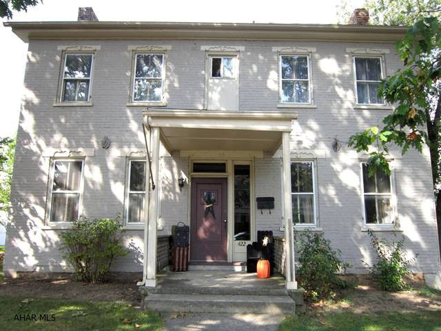 Delight in an interior designer's home. All rooms command attention. Very  nice throughout (see video). Wonderful formal living and dining rooms. Amazing attention to detail. Eat-in kitchen, main floor laundry and screened in porch. Large garage and private yard round out this lovely home that is priced to sell. Why rent when you can own!