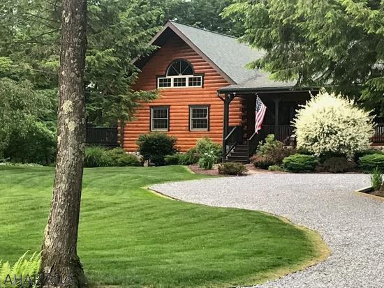 This home is one of a kind! 4 bdrm log home. Huge eat-in kitchen with hickory cabinets and center island, all brand new appliances included. Large living room with stone fireplace.. Loft could be a 5th bedroom or family room, front and large side porch and a oversized 2 car garage. Very quiet neighborhood, located in Central Cambria School District just minutes from town. This is a Must See Home!!!